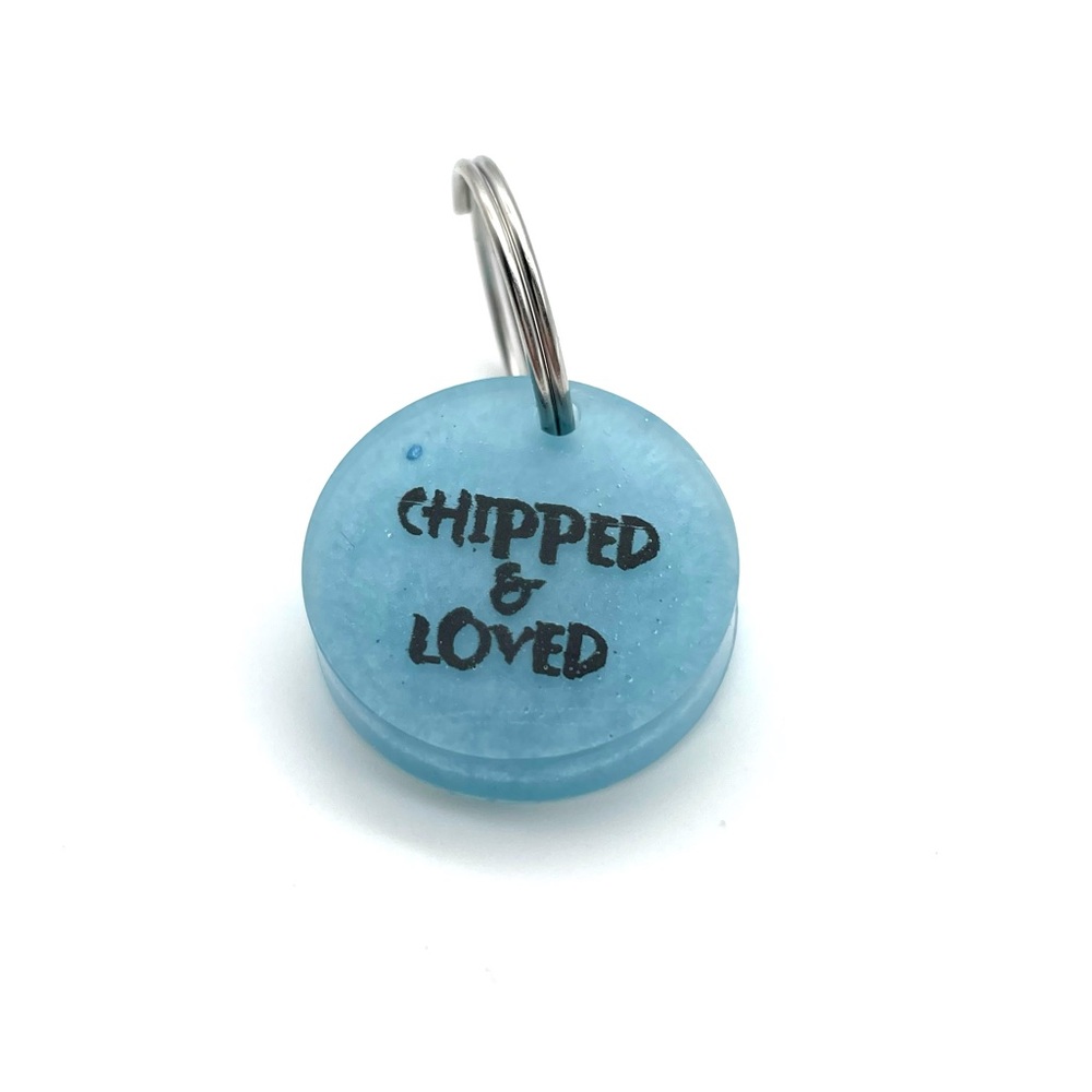 “Chipped & Loved” tag for pets collar